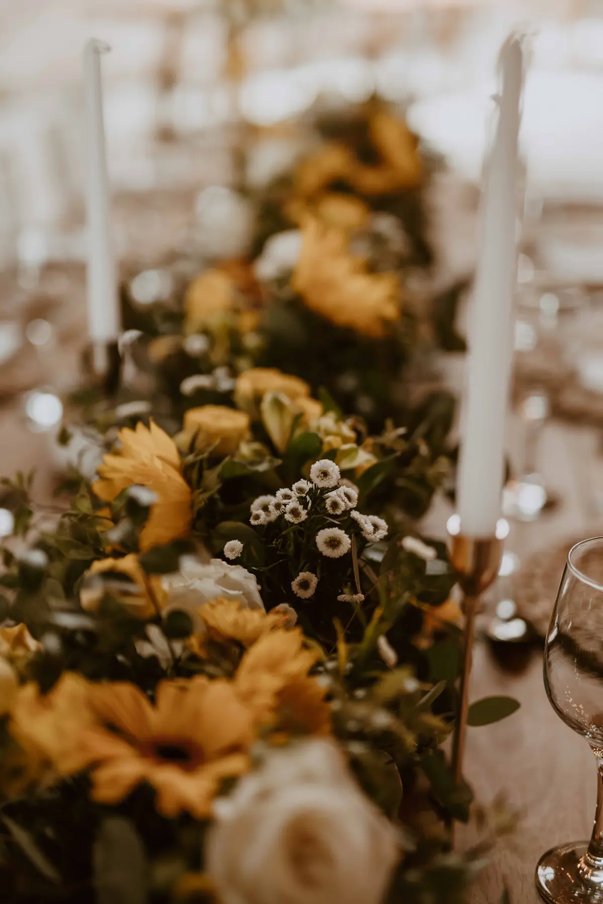Picture of flowers on table designed by Two Balloons Weddings & Events