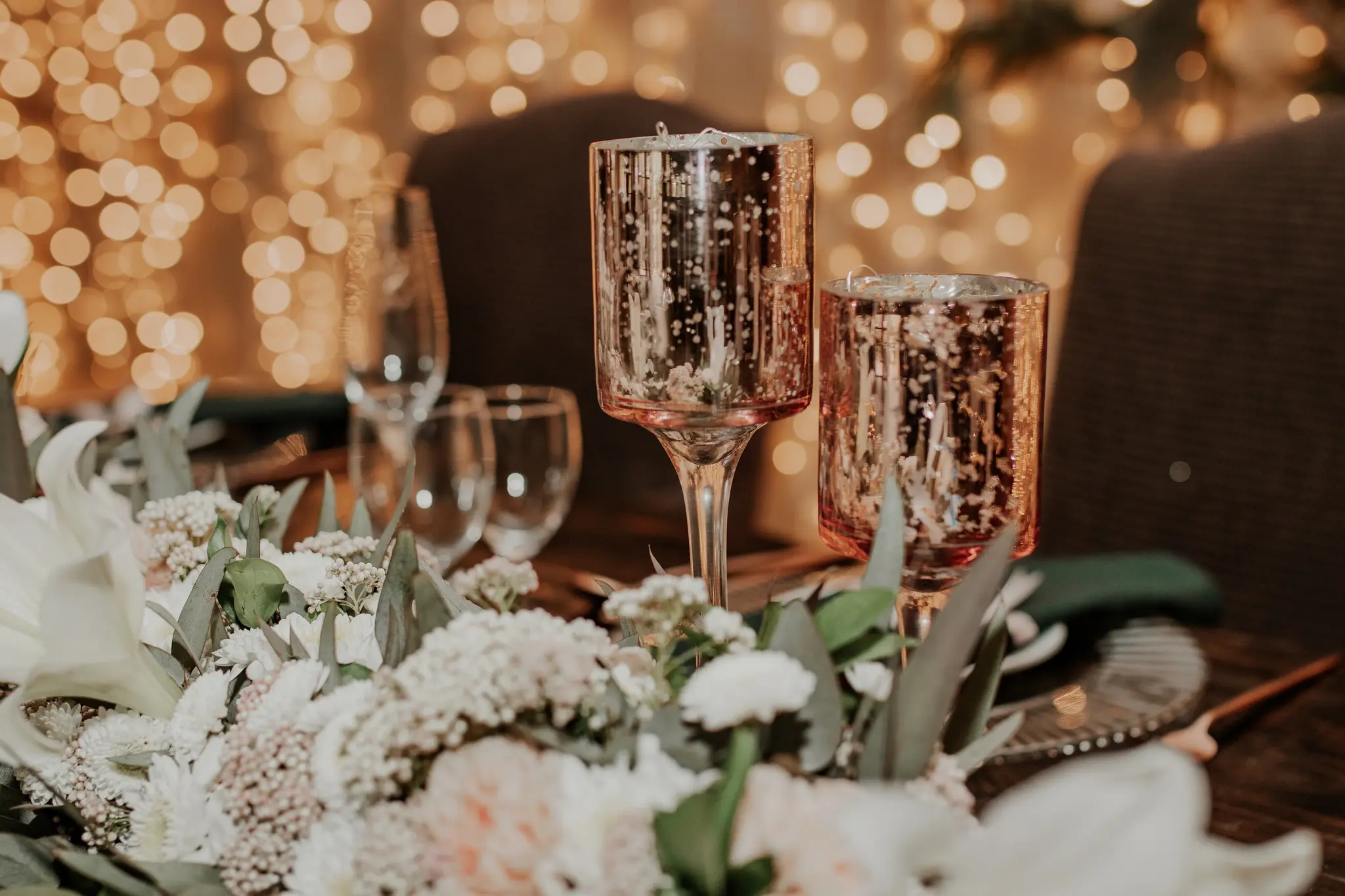 An image of table setting and decor designed by Two Balloons Weddings & Events