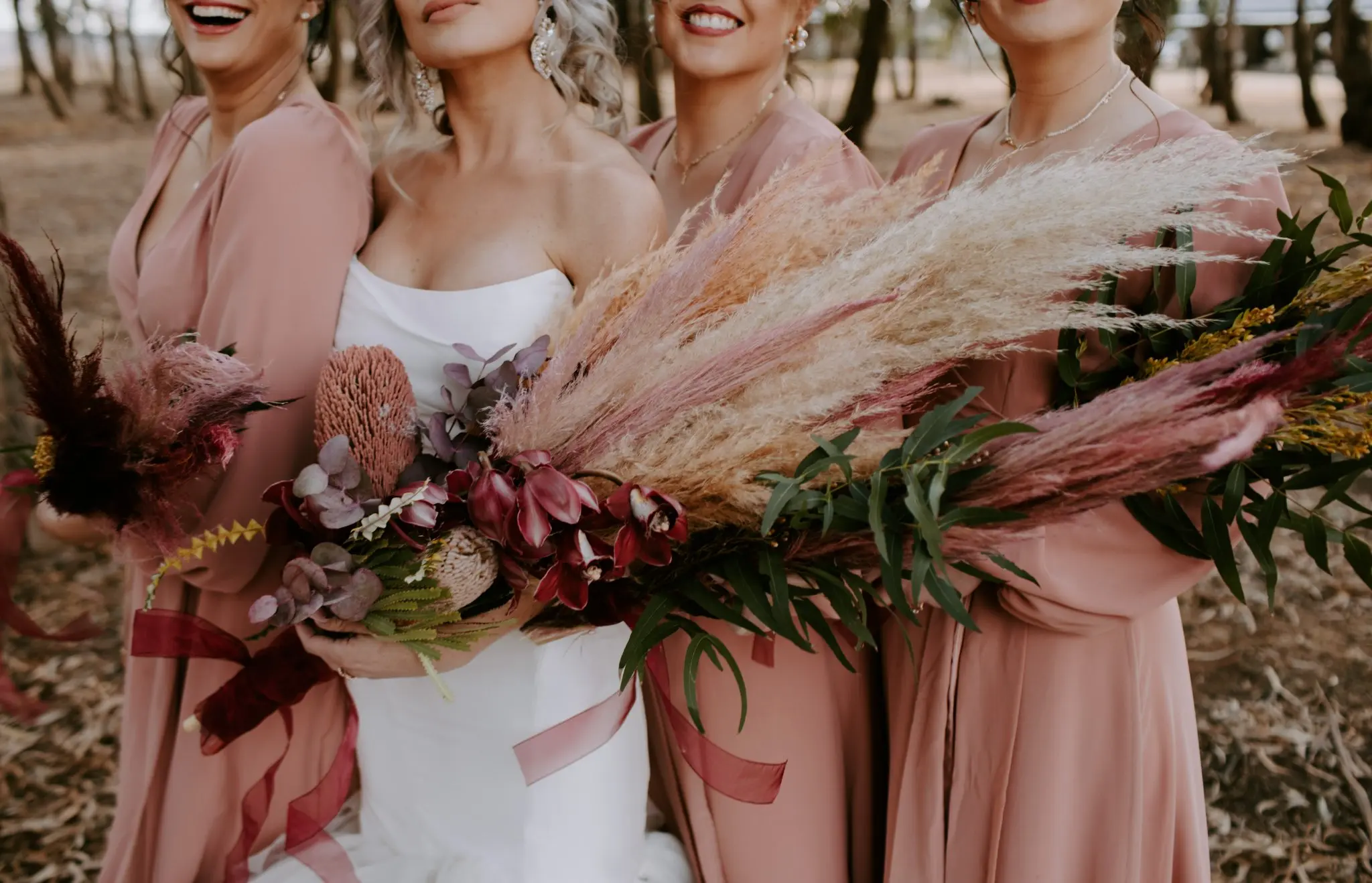 A picture of Zania's bridesmaids with floral design by Two Balloons Weddings & Events